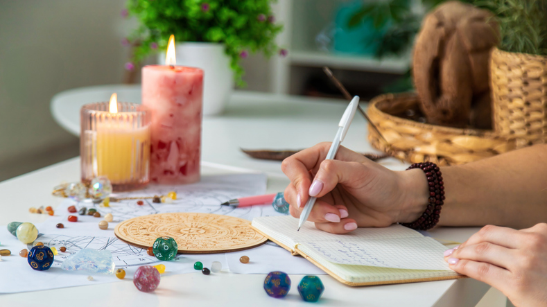 Woman Drawing Astrological Charts