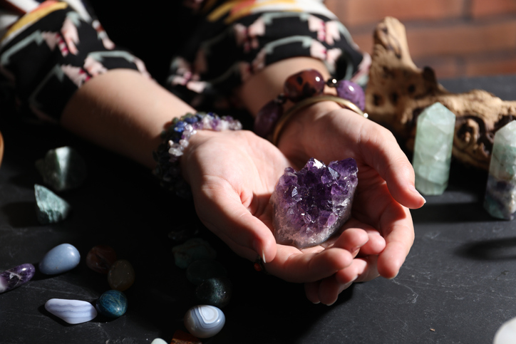Witch Holding Crystals